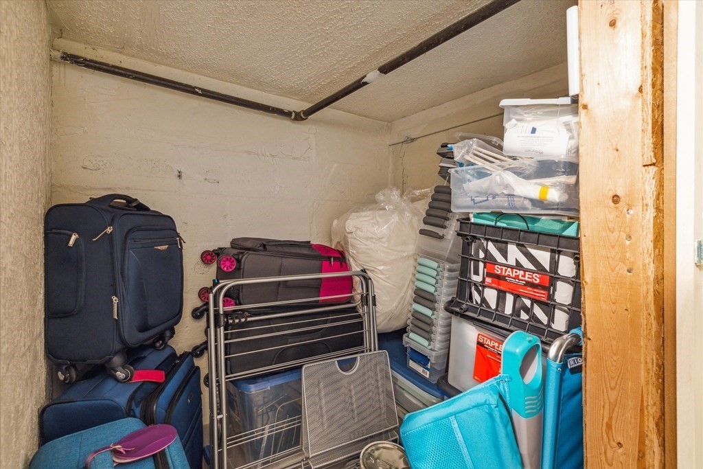 12 Benton Street, Unit 4 Stoneham, MA 02180 - Photo 35 of 35 a utility room with dryer and washer