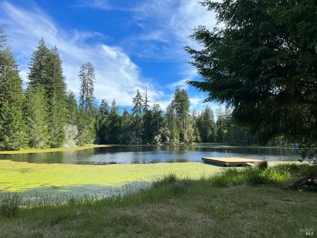 a view of a swimming pool with an outdoor space and seating area