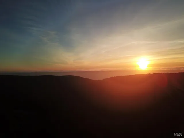 a view of a backyard of a house