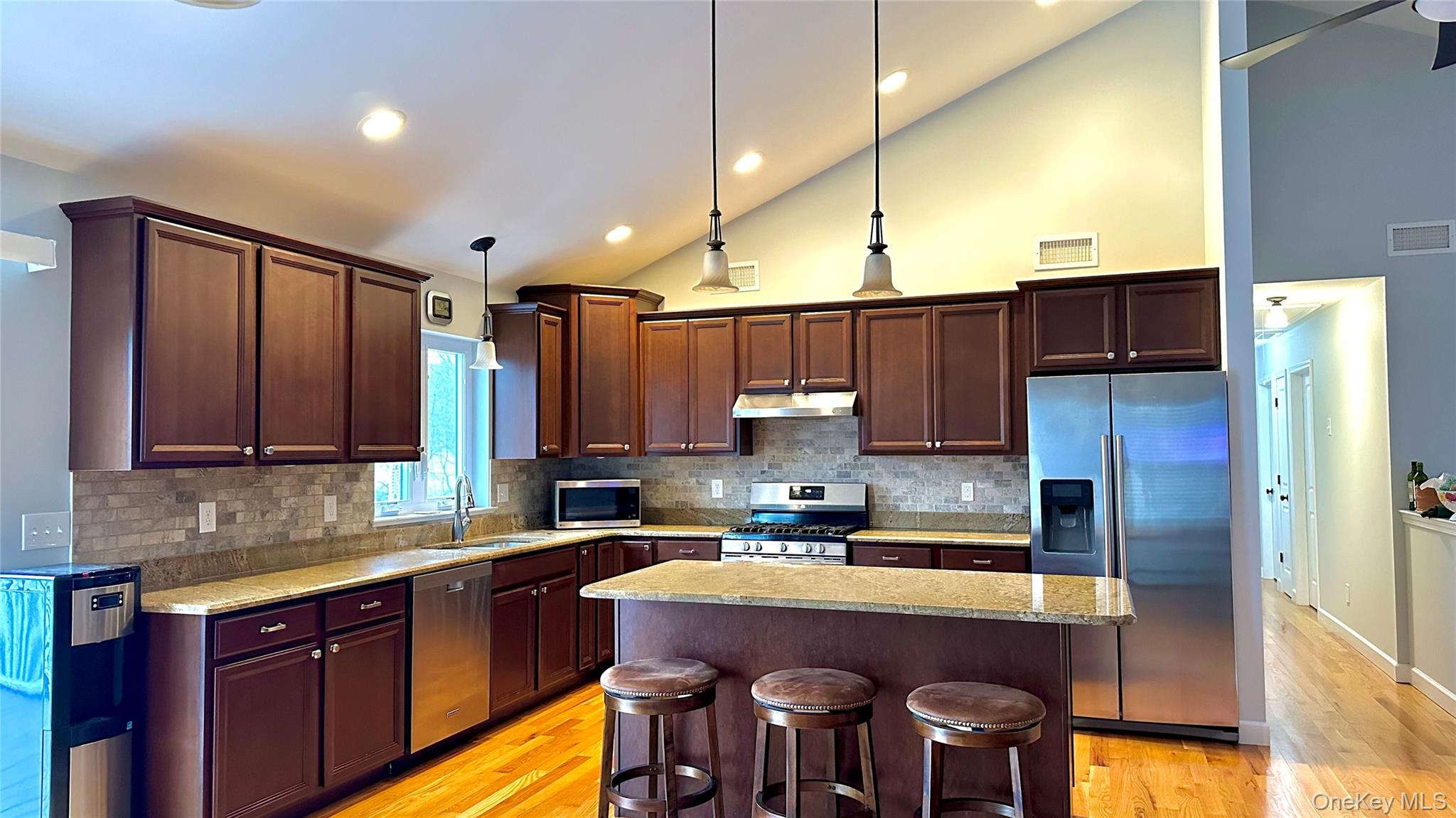 1091 Ridgebury Road New Hampton, NY 10958 - Photo 10 of 27 a kitchen with a sink refrigerator and cabinets