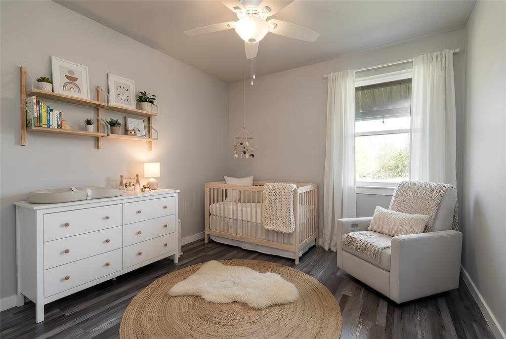 115 Valley Ridge Drive Bridgeport, TX 76426 - Photo 26 of 35 a bedroom with furniture and a window