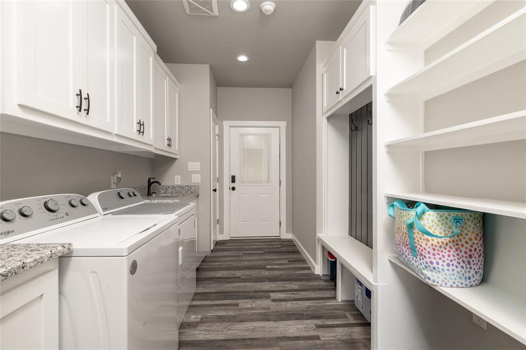 115 Valley Ridge Drive Bridgeport, TX 76426 - Photo 31 of 35 a view of a hallway with washer and dryer