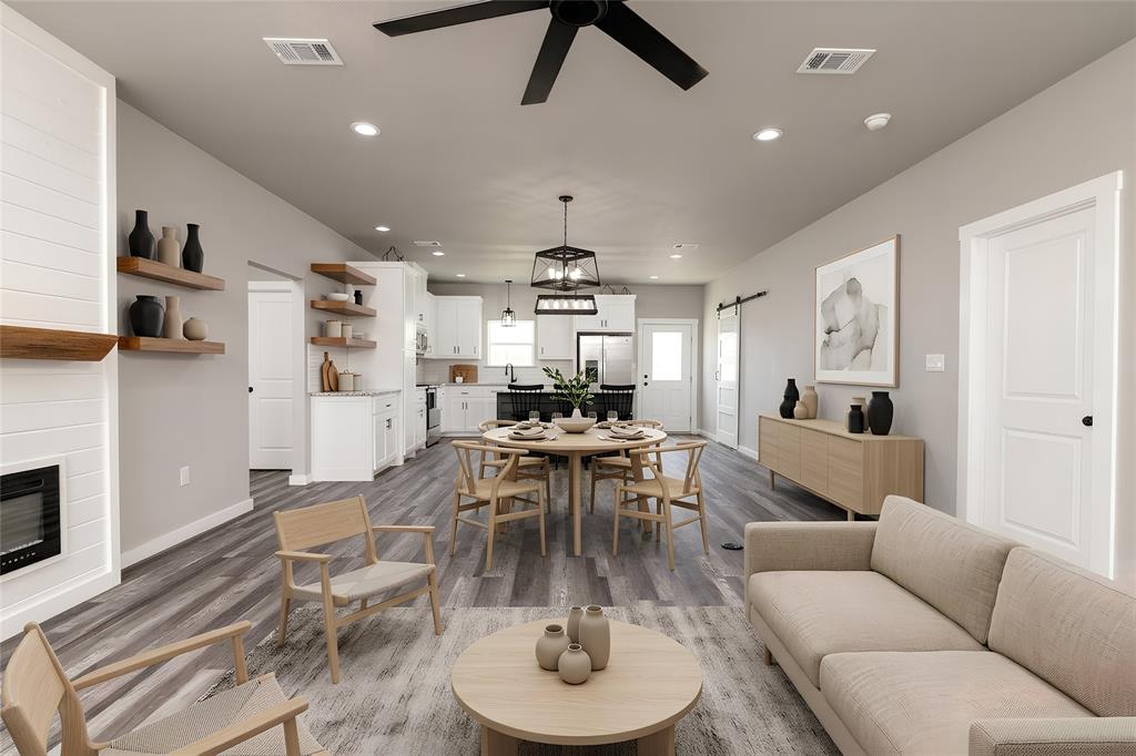 115 Valley Ridge Drive Bridgeport, TX 76426 - Photo 6 of 35 a living room with furniture and a wooden floor