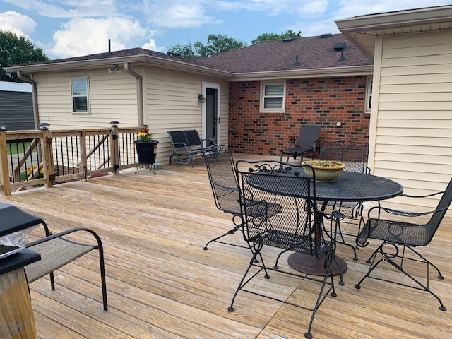 3078 Big Springs Road Lebanon, TN 37090 - Photo 6 of 24 a view of a patio with table and chairs and wooden floor