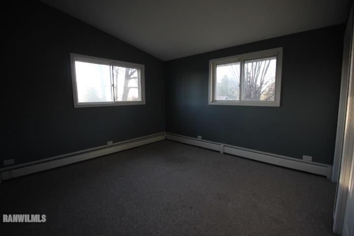986 West Angle Road Freeport, IL 61032 - Photo 13 of 16 a view of an empty room with a window