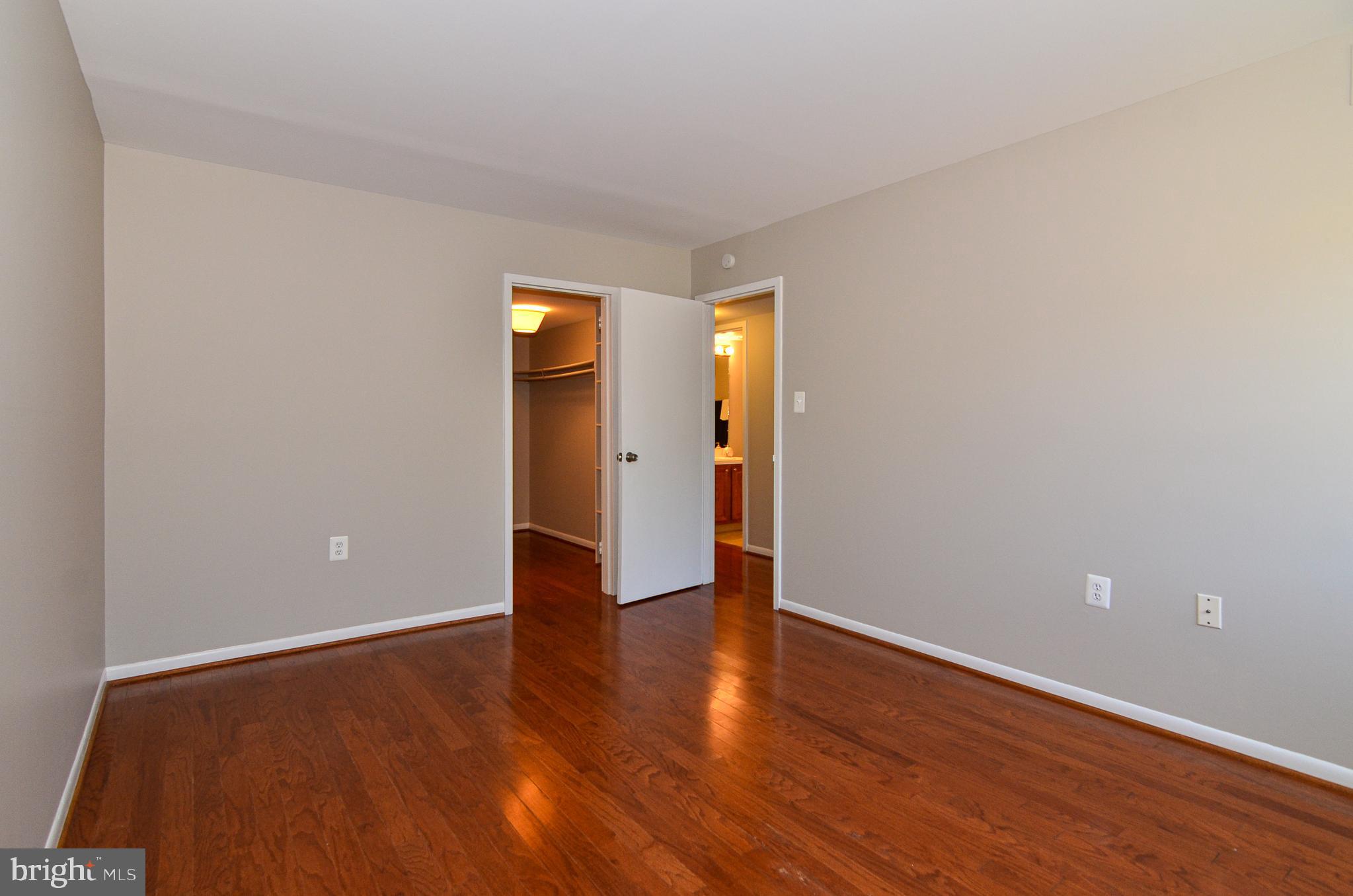 1427 Northgate Square, Unit 11B Reston, VA 20190 - Photo 17 of 41 Large Master Bedroom