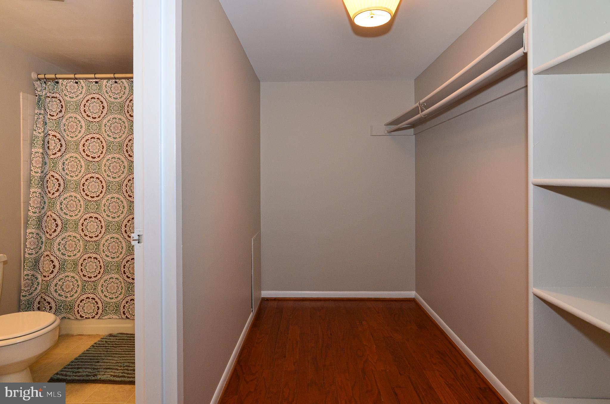 1427 Northgate Square, Unit 11B Reston, VA 20190 - Photo 18 of 41 Master Closet adjoins the Master Bathroom