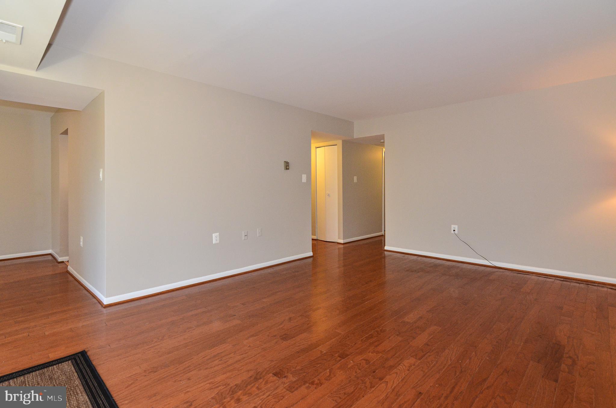 1427 Northgate Square, Unit 11B Reston, VA 20190 - Photo 9 of 41 Spacious Living Room
