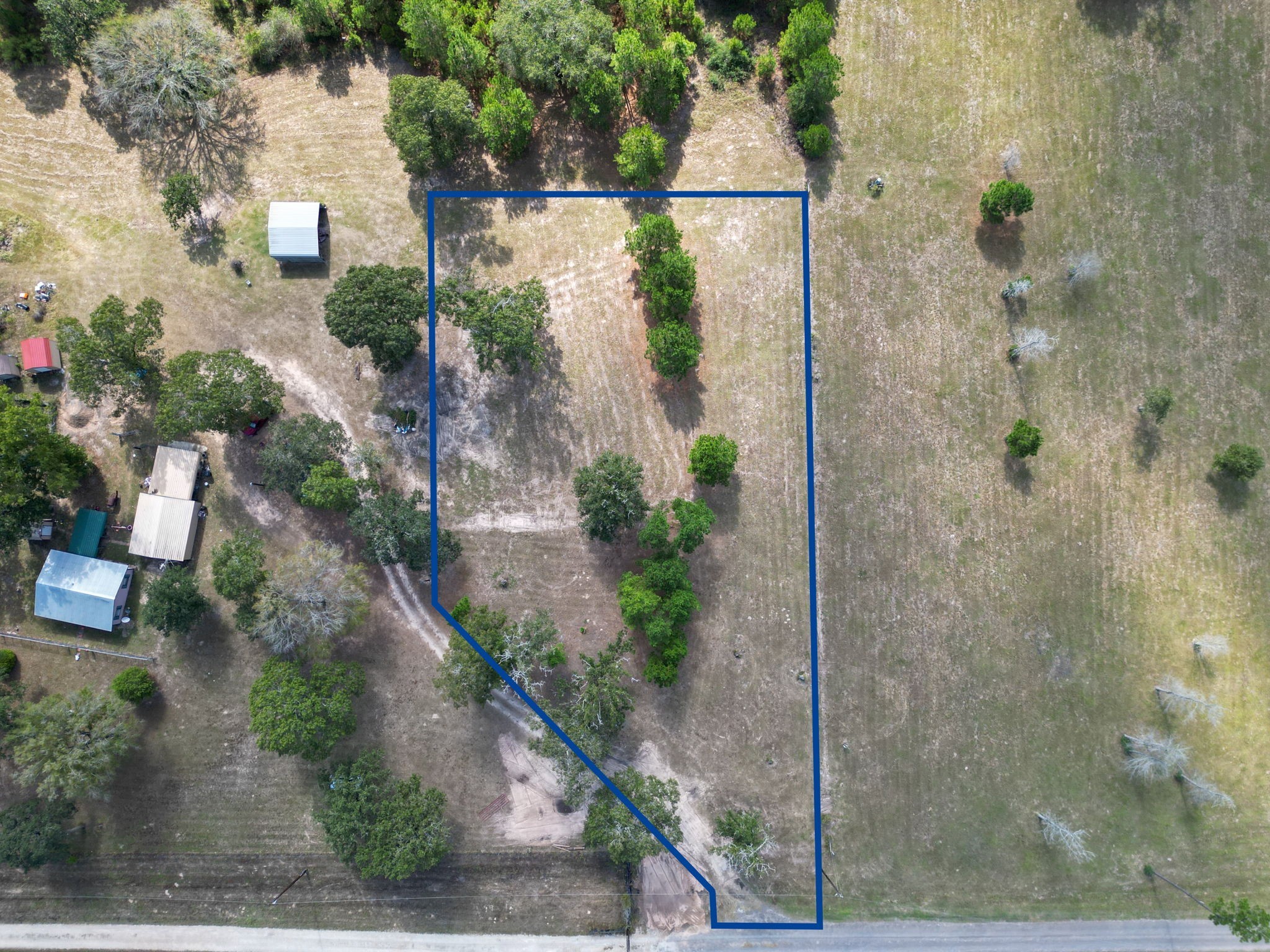Tbd Slot Road Navasota, TX 77868 - Photo 2 of 12 a view of a balcony with a potted plants