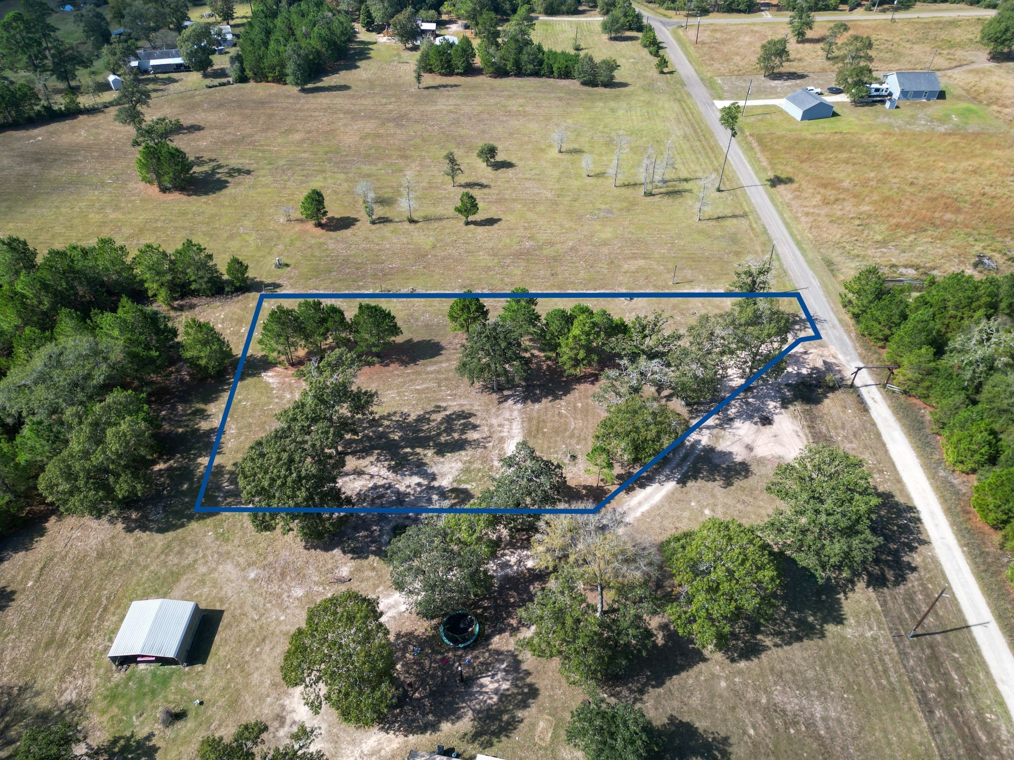 Tbd Slot Road Navasota, TX 77868 - Photo 5 of 12 an aerial view of a house with a yard
