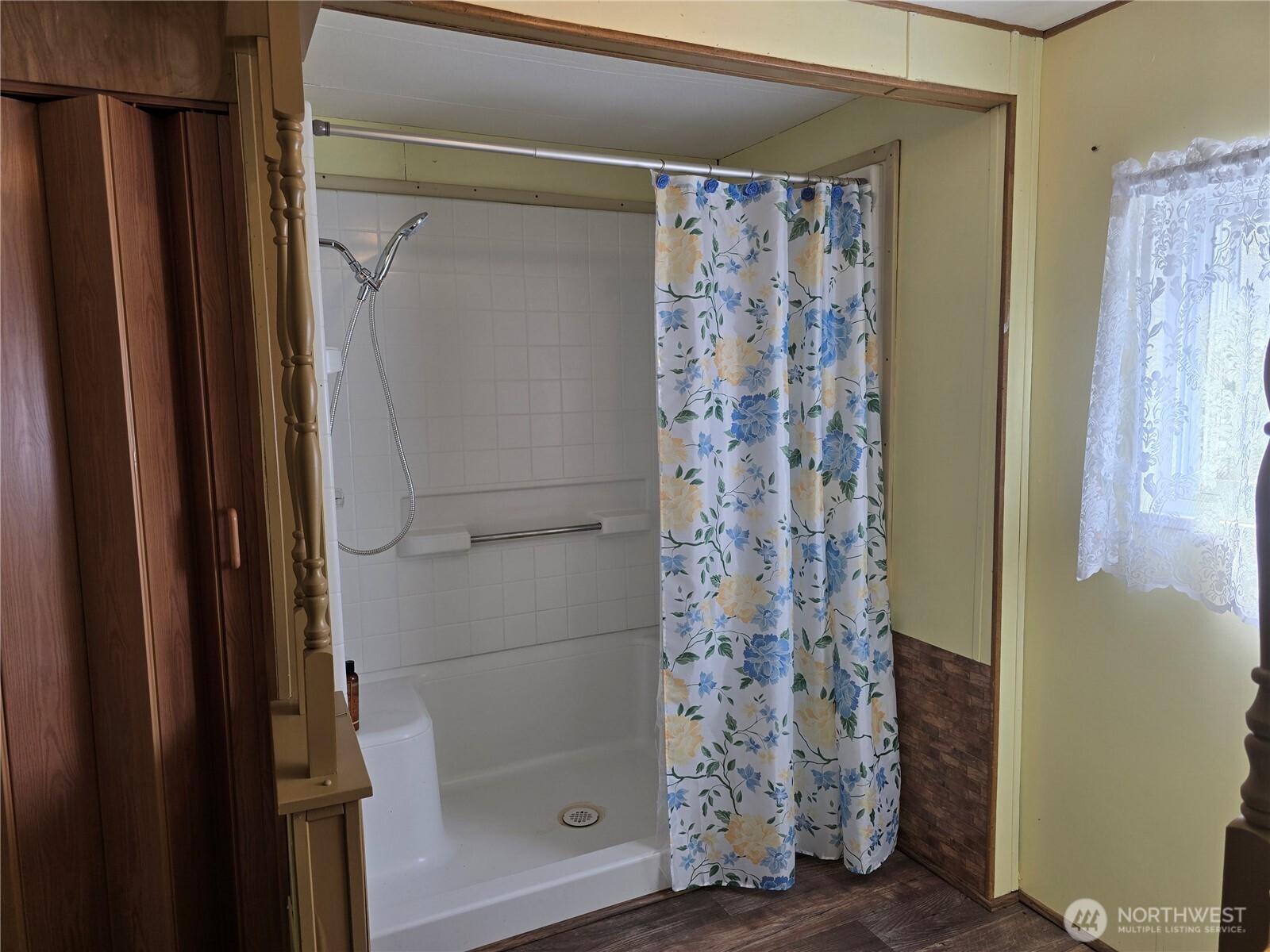 147-21 Morris Road, Unit 21 Randle, WA 98377 - Photo 17 of 31 a bathroom with a shower and a mirror