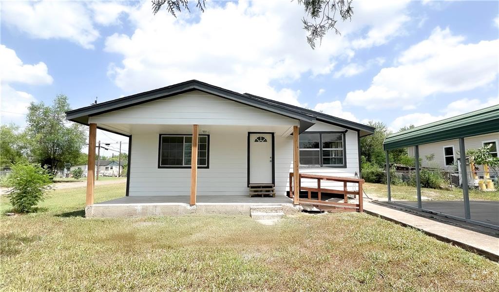 302 La Jara Avenue Santa Rosa, TX 78593 - Photo 1 of 13 a view of a house with backyard and porch