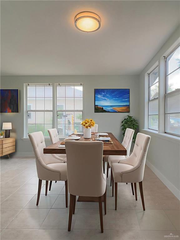 302 La Jara Avenue Santa Rosa, TX 78593 - Photo 3 of 13 a view of a dining room with furniture a couch and wooden floor