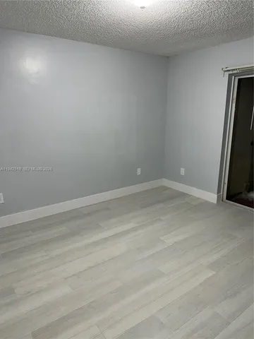 a car parked in front of a house