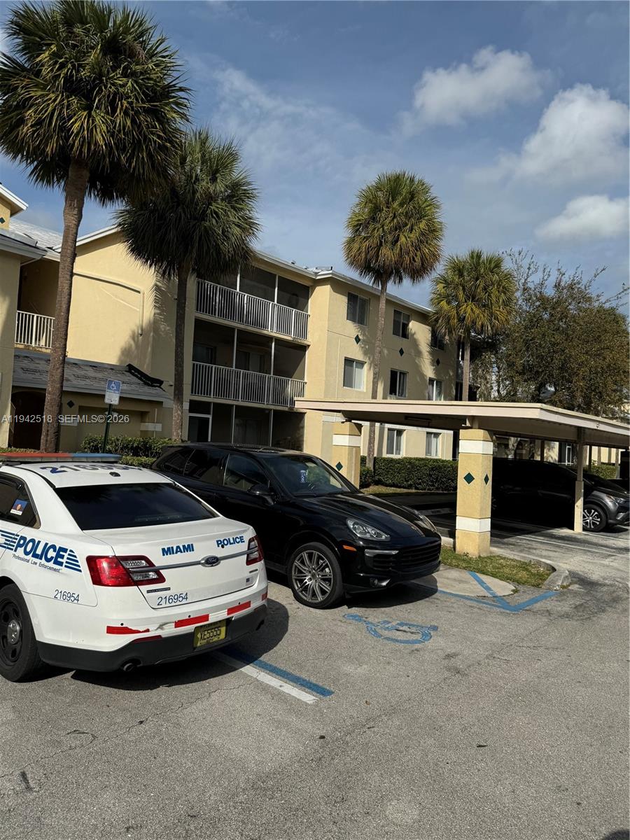 440 South Park Road, Unit 4207 Hollywood, FL 33021 - Photo 14 of 14 a car parked in front of a house