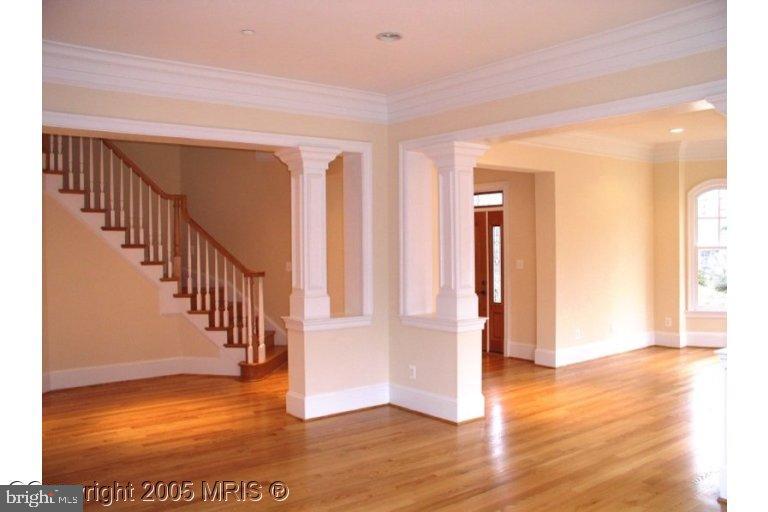 5711 Ridgefield Road Bethesda, MD 20816 - Photo 4 of 6 a view of entryway with wooden floor