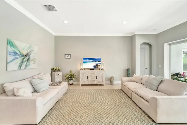 a living room with furniture and a couch