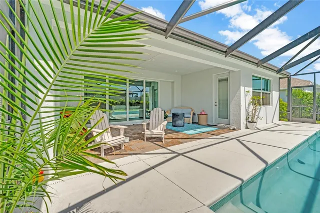 a view of yard with patio