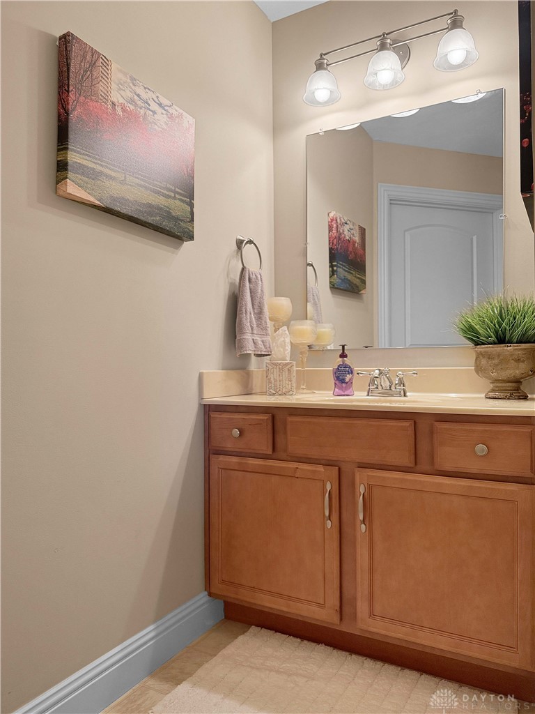 4096 Middle Urbana Road Urbana, OH 43078 - Photo 10 of 96 This bathroom features a sleek vanity, offering ample storage and a contemporary design.