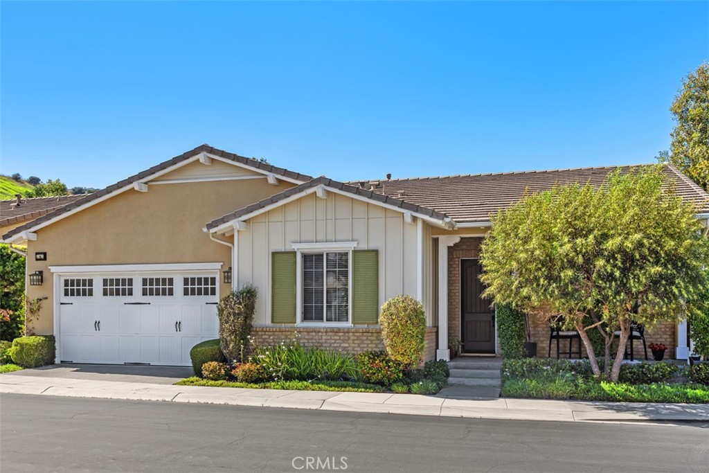 front view of a house with a small yard