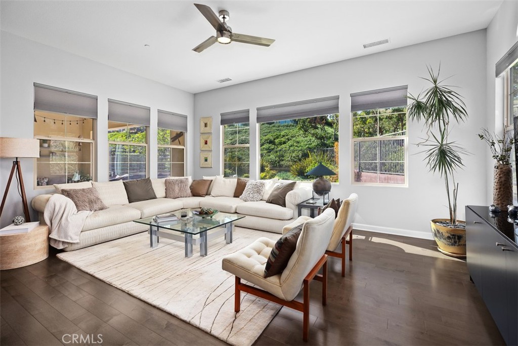 3 Planeo Rancho Mission Viejo, CA 92694 - Photo 13 of 37 a living room with furniture and a large window