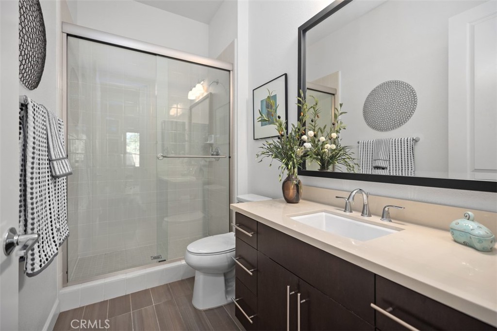 3 Planeo Rancho Mission Viejo, CA 92694 - Photo 16 of 37 a bathroom with a sink a toilet and shower