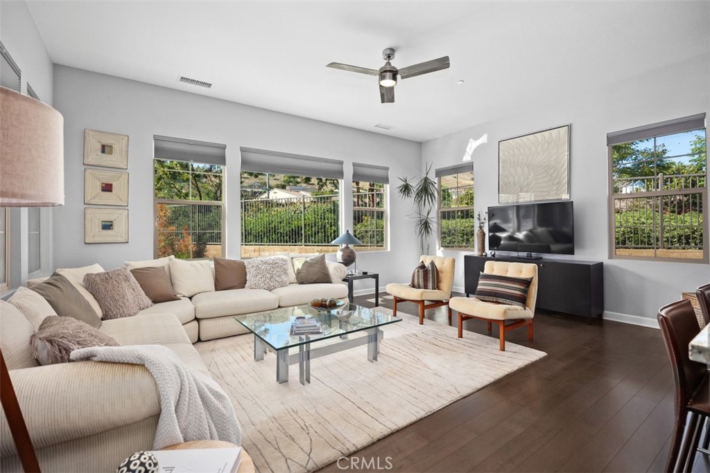 3 Planeo Rancho Mission Viejo, CA 92694 - Photo 17 of 37 a living room with furniture and a large window
