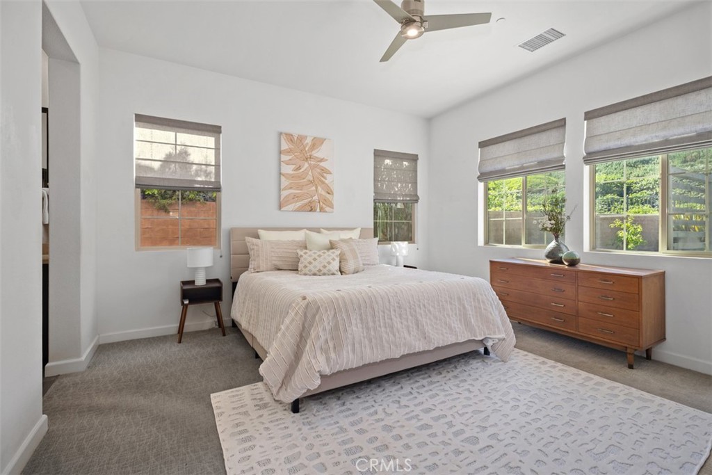 3 Planeo Rancho Mission Viejo, CA 92694 - Photo 19 of 37 a bedroom with a large bed and a window