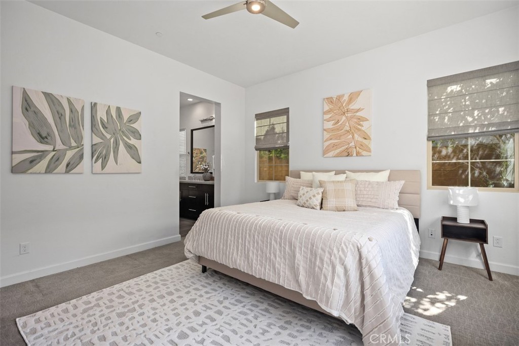 3 Planeo Rancho Mission Viejo, CA 92694 - Photo 20 of 37 a bedroom with a large bed and a window