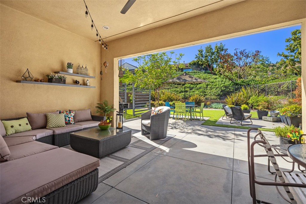 3 Planeo Rancho Mission Viejo, CA 92694 - Photo 25 of 37 a outdoor living space with furniture and garden view