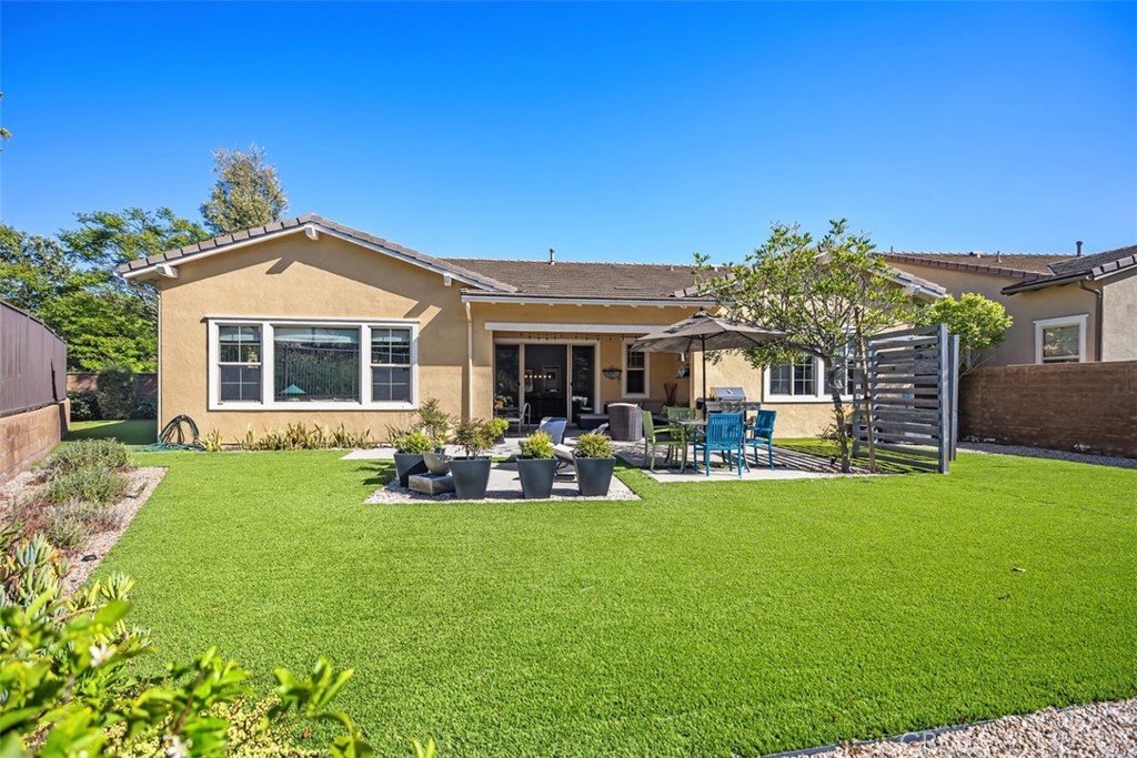 3 Planeo Rancho Mission Viejo, CA 92694 - Photo 28 of 37 a front view of a house with yard porch and furniture