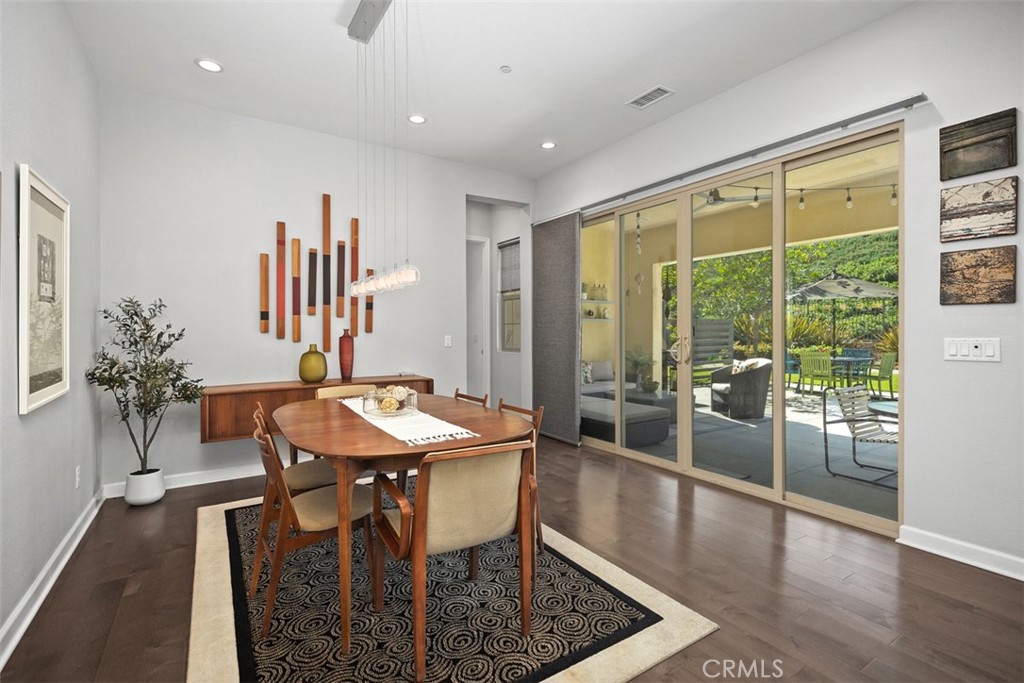 3 Planeo Rancho Mission Viejo, CA 92694 - Photo 5 of 37 a dining room with furniture and wooden floor