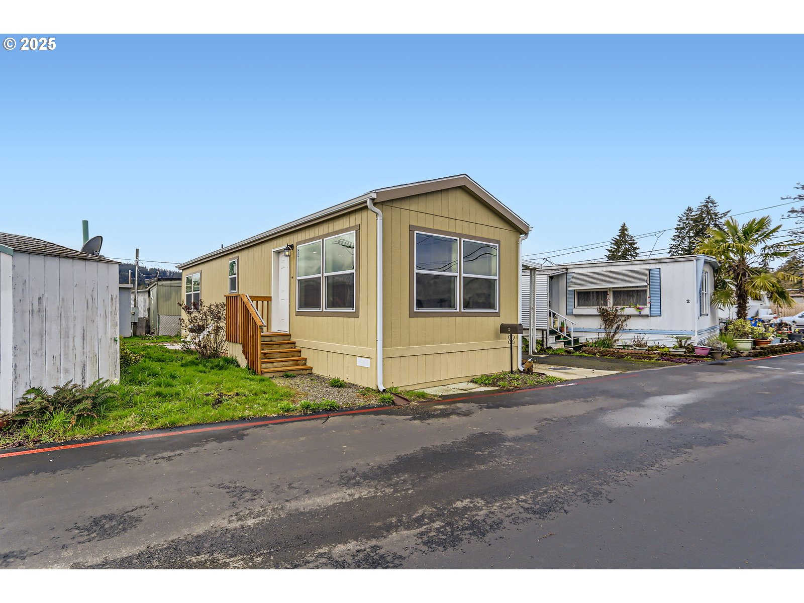 19605 River Road, Unit 3 Gladstone, OR 97027 - Photo 2 of 13 a view of a house with backyard