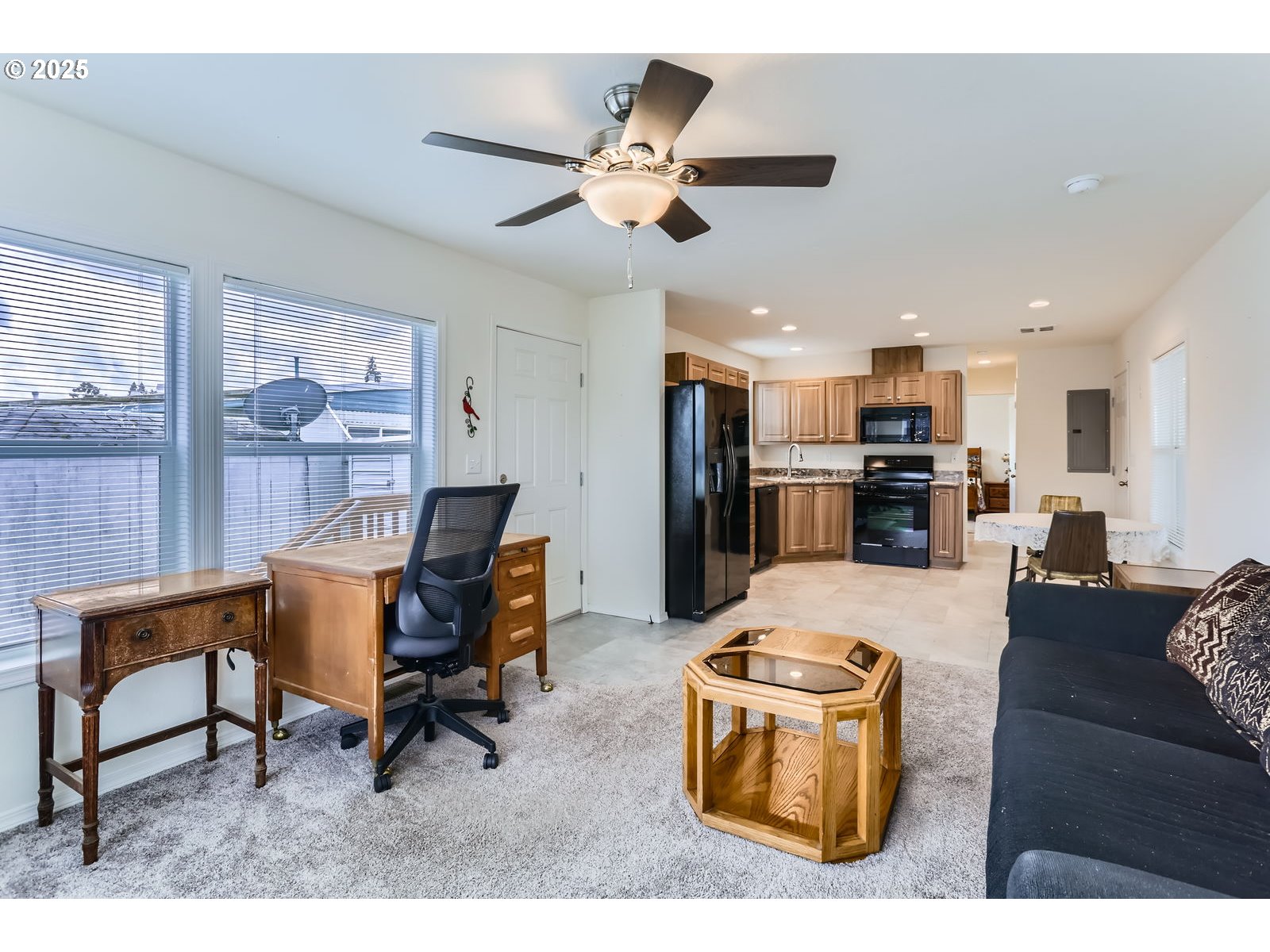19605 River Road, Unit 3 Gladstone, OR 97027 - Photo 4 of 13 a living room with furniture and kitchen view