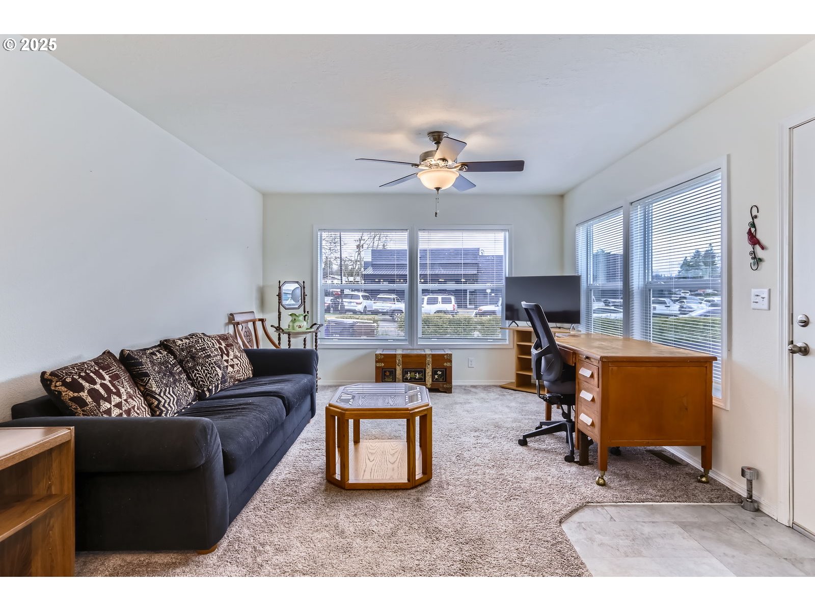 19605 River Road, Unit 3 Gladstone, OR 97027 - Photo 5 of 13 a living room with furniture and a large window