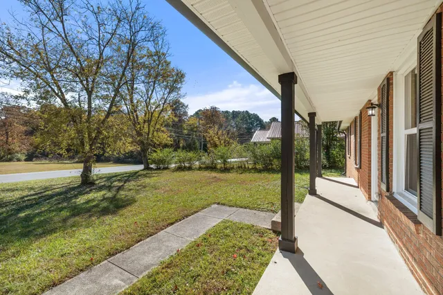 a view of a back yard of the house