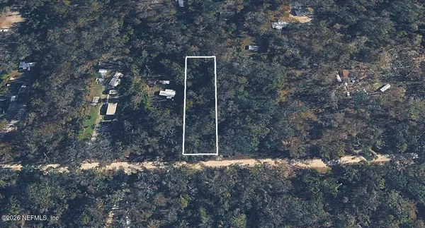 a view of a house with a tree