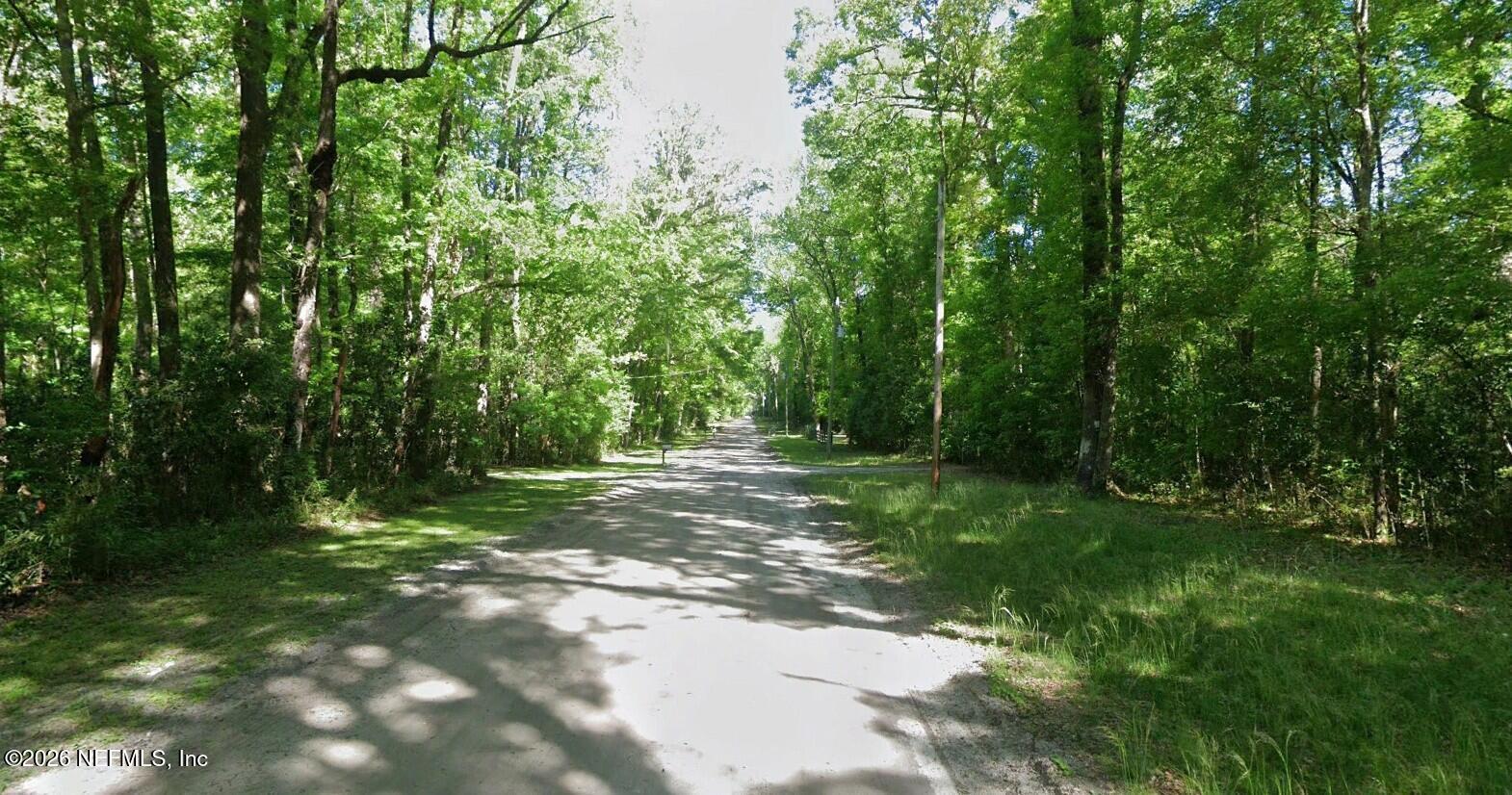 0 Southwest Boston Terrace Fort White, FL 32038 - Photo 2 of 3 a view of a trees with a yard