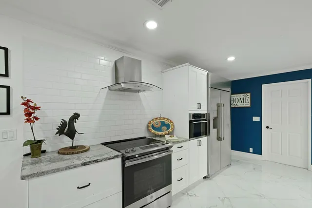 a kitchen with sink and window