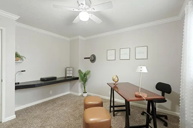 an aerial view of a house with a swimming pool