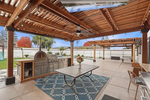 a view of a house with a yard porch and sitting area