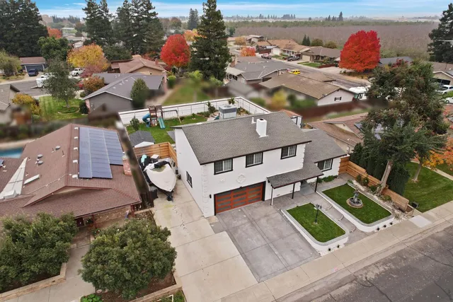 an aerial view of a city with lots of residential buildings