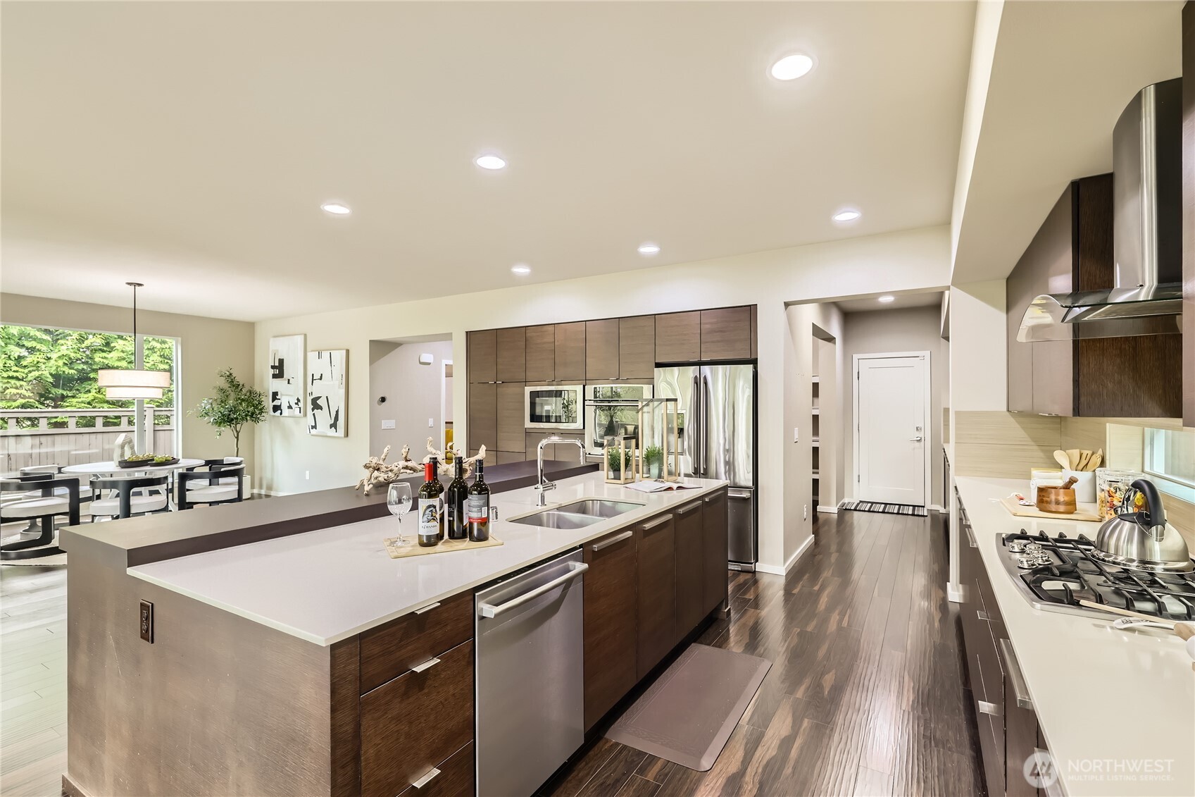3702 170th Place Southeast Bothell, WA 98012 - Photo 12 of 40 a kitchen with stainless steel appliances a sink stove and cabinets