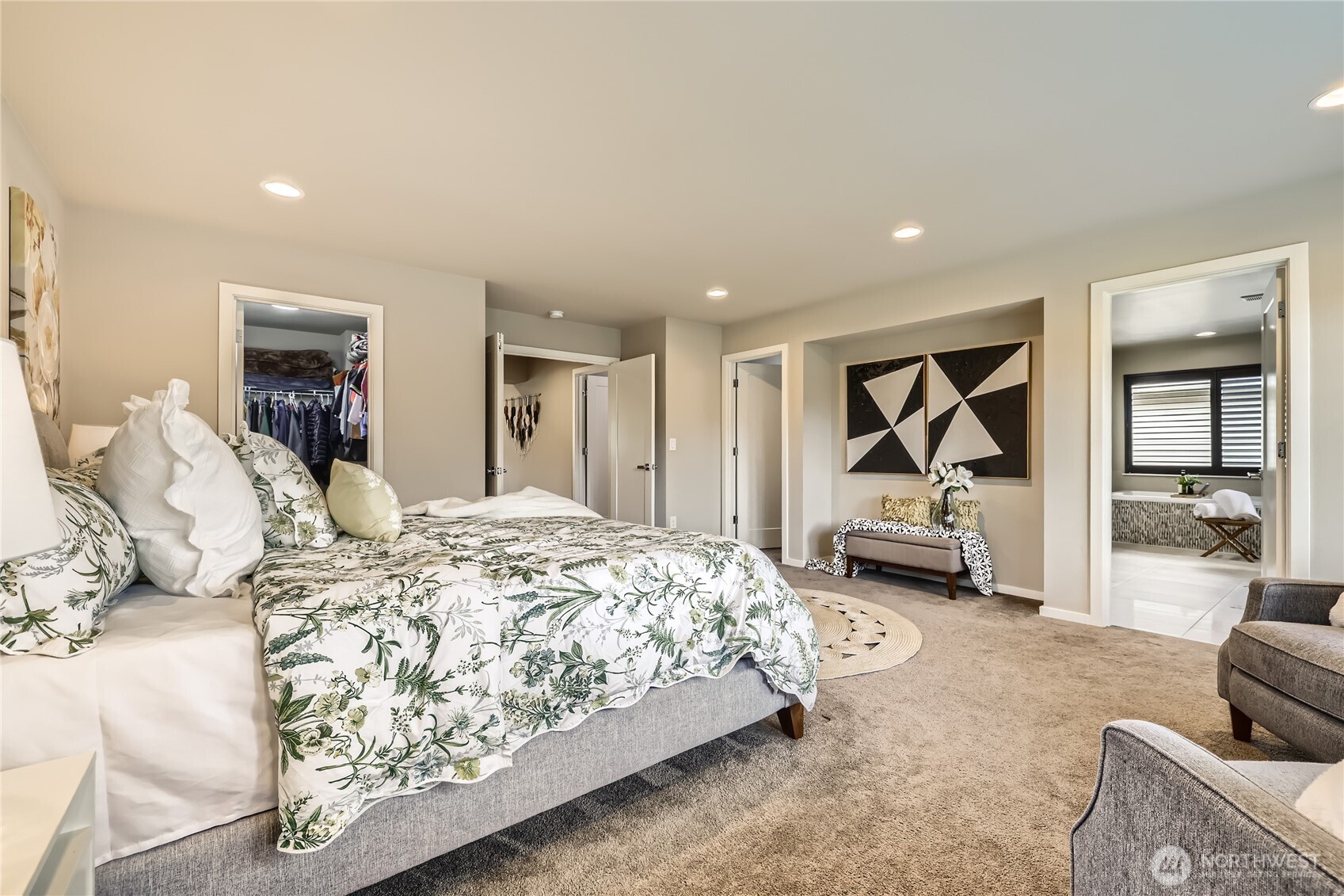 3702 170th Place Southeast Bothell, WA 98012 - Photo 21 of 40 a spacious bedroom with a bed and a couch