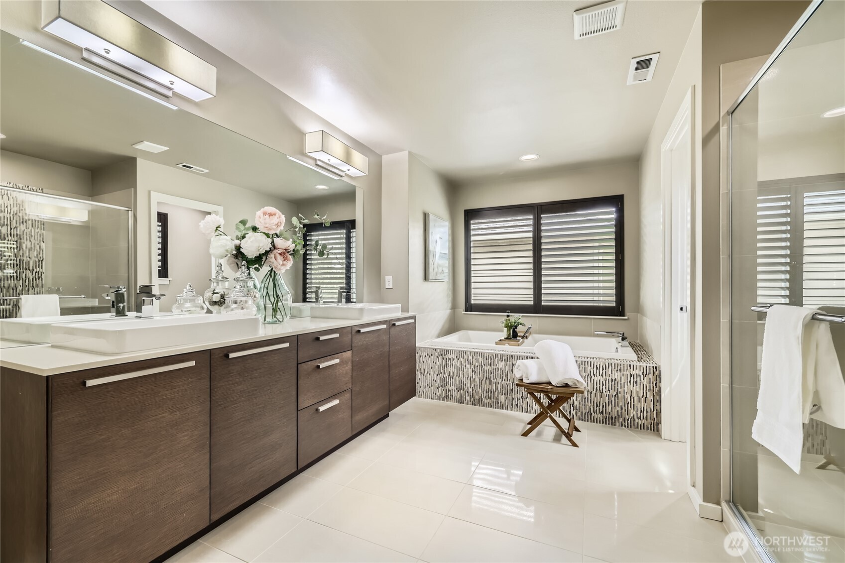 3702 170th Place Southeast Bothell, WA 98012 - Photo 23 of 40 a spacious bathroom with a granite countertop sink and a bathtub