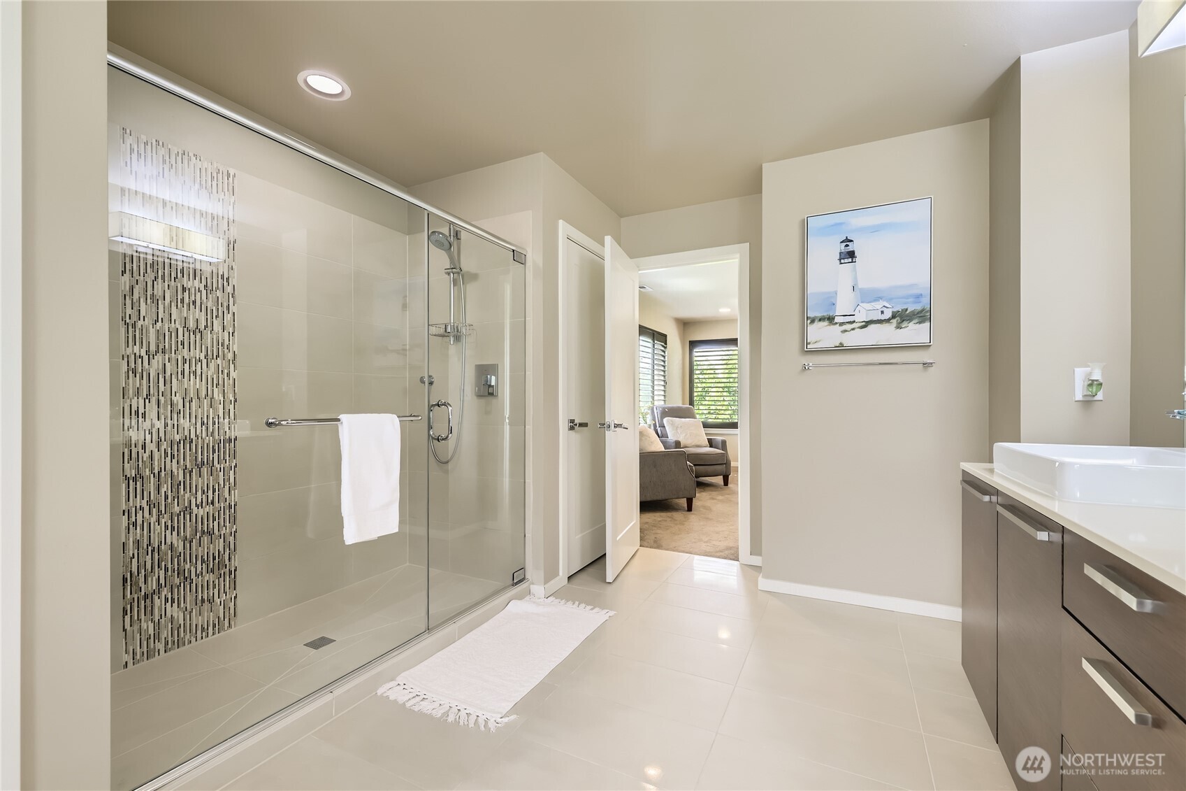 3702 170th Place Southeast Bothell, WA 98012 - Photo 24 of 40 a bathroom with a shower and a sink
