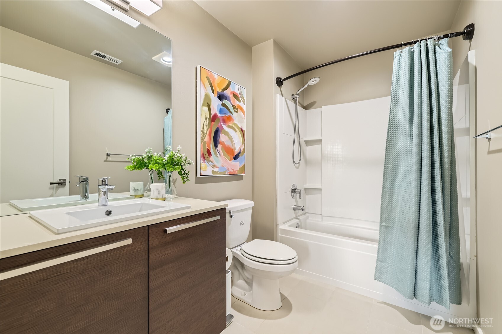 3702 170th Place Southeast Bothell, WA 98012 - Photo 28 of 40 a bathroom with a sink a toilet and shower