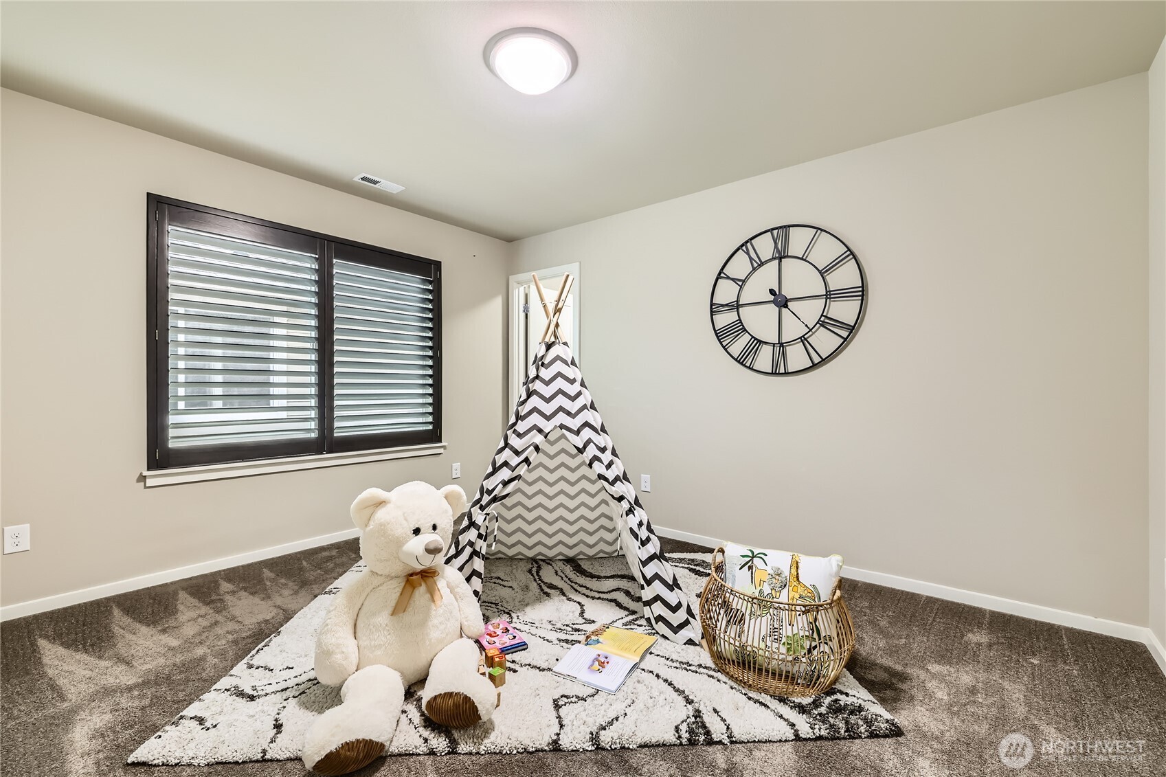 3702 170th Place Southeast Bothell, WA 98012 - Photo 30 of 40 a bedroom with a bed and a window