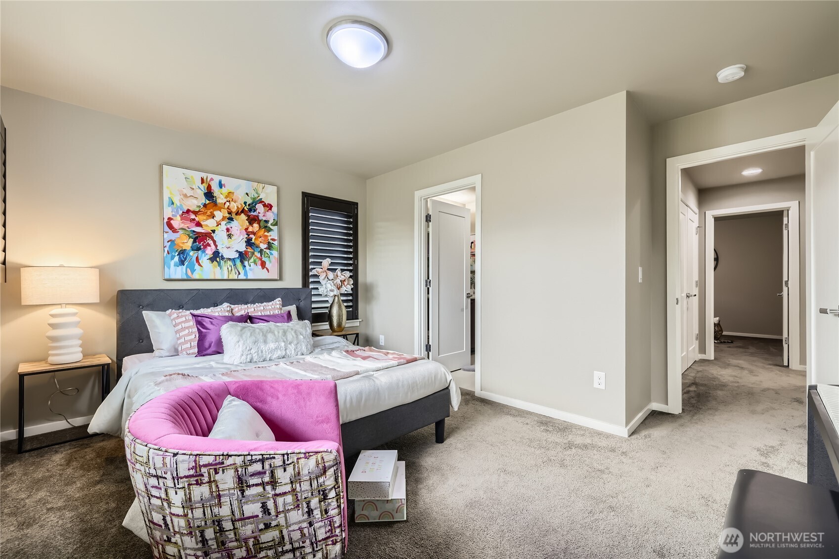 3702 170th Place Southeast Bothell, WA 98012 - Photo 32 of 40 a bedroom with a bed and a painting on the wall