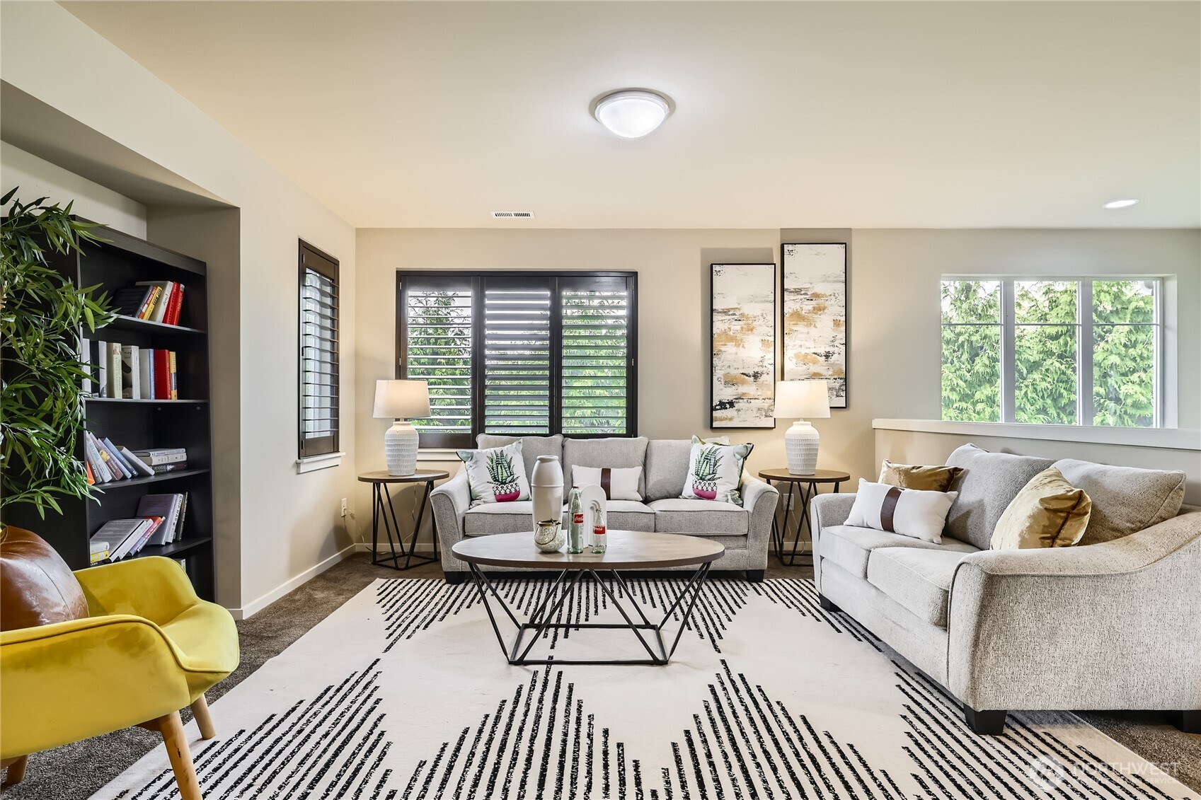 3702 170th Place Southeast Bothell, WA 98012 - Photo 35 of 40 a living room with furniture and a large window